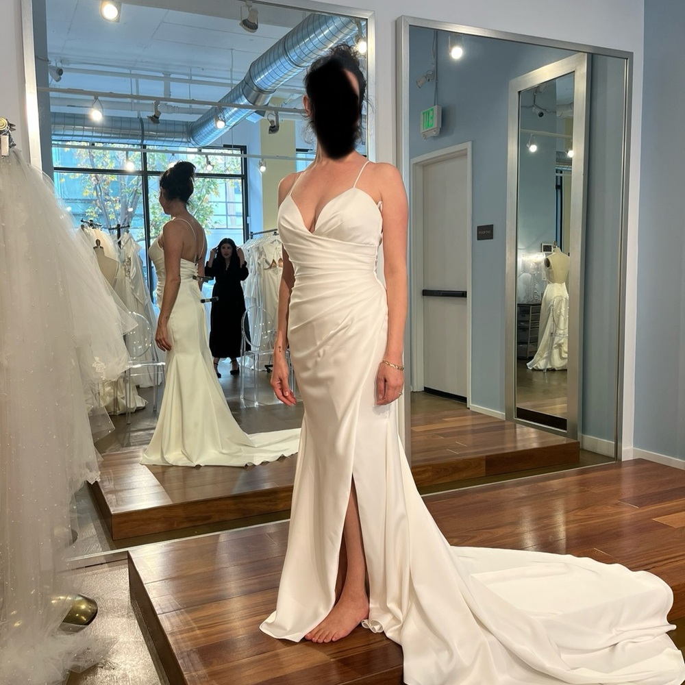 Elegant Paloma Blanca Strap Bridal Gown with Slit
